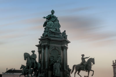 Low angle view of statue against sky