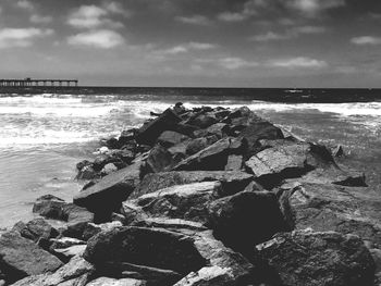 Scenic view of sea against cloudy sky