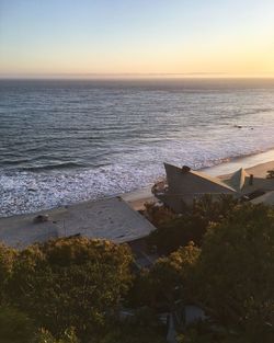 Scenic view of sea at sunset