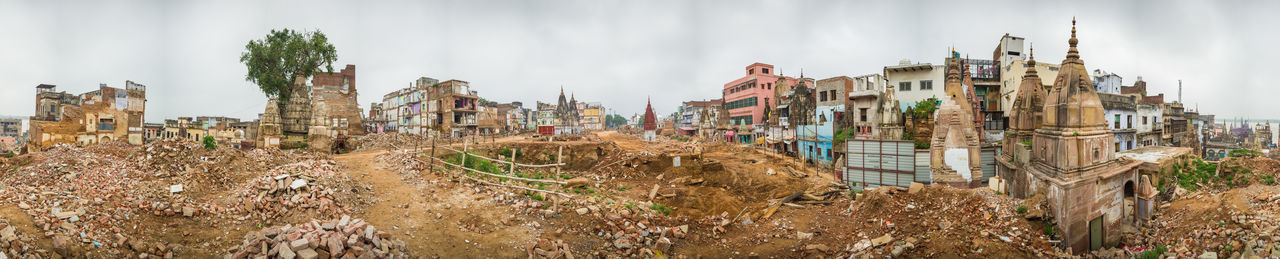 Panoramic view of old buildings against sky