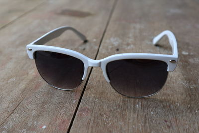 Close-up of sunglasses on table