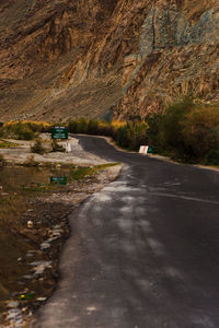 Road leading towards mountains