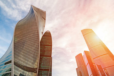 Low angle view of modern buildings against sky