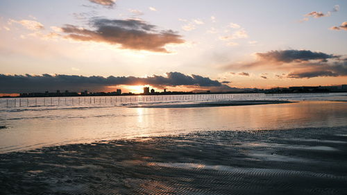 Scenic view of sea against sky during sunset