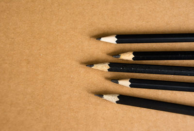 High angle view of pencils on table