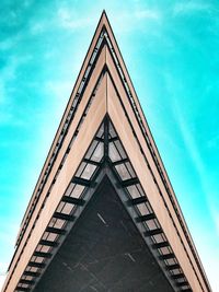 Low angle view of office building against sky