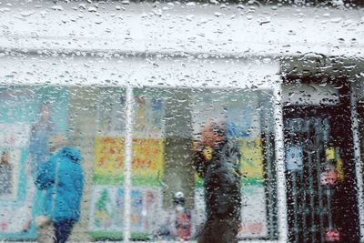 Full frame shot of wet glass window in rainy season