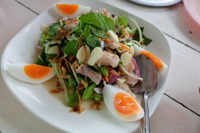 High angle view of breakfast served on table