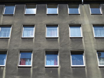 Low angle view of windows in a row