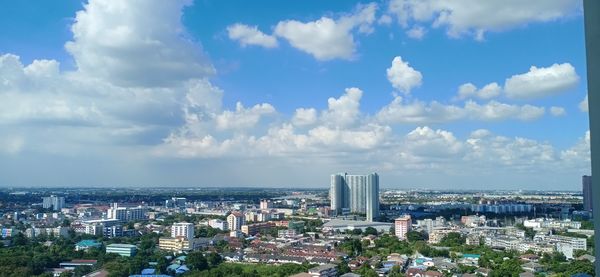 High angle view of buildings against sky in city