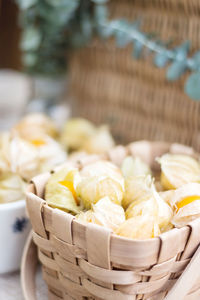 High angle view of winter cherries for sale in wicker basket