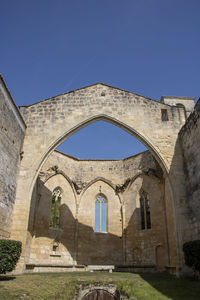 View of historical building against clear blue sky