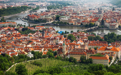 High angle view of river in city against sky