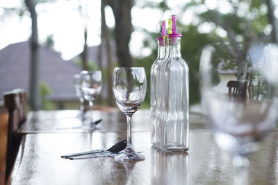 Glass bottle on table