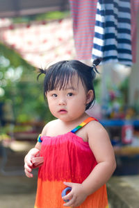 Portrait of cute girl looking away