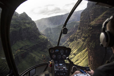 Lokkout of helicopter cockpit during flight in the waimea canyon - kauai