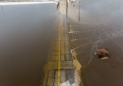 High angle view of puddle on street