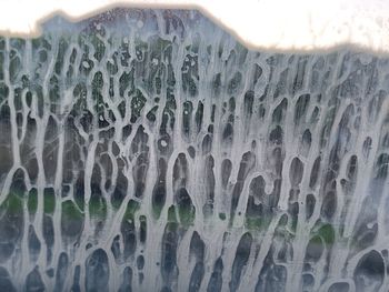 Close-up of wet glass window