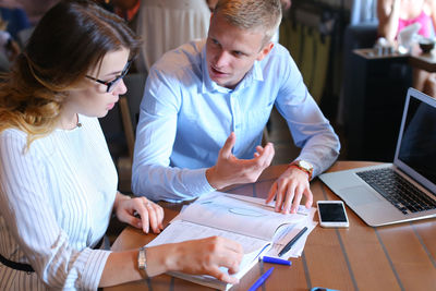 Business colleagues working at office