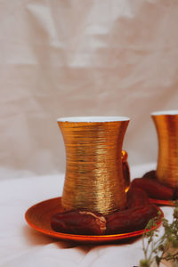 Close-up of tea cup on table