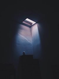 Sunlight falling through skylight in darkroom