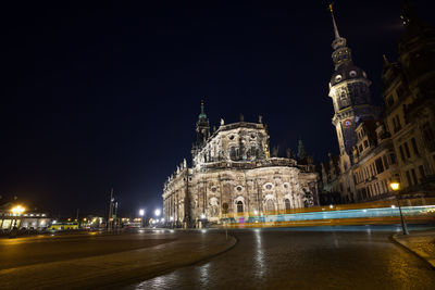 Illuminated buildings in city at night