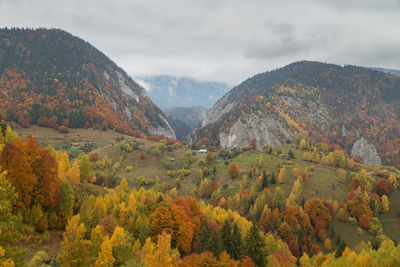 Scenic view of mountains against sky during autumn