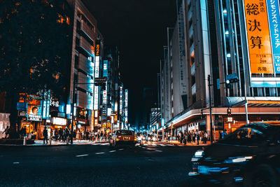 Traffic on city street at night