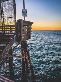 Scenic view of sea against clear sky during sunset