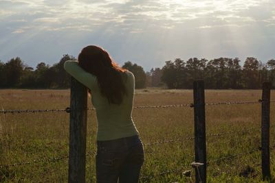 Man standing on grassy field