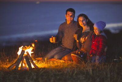 Group of people at bonfire