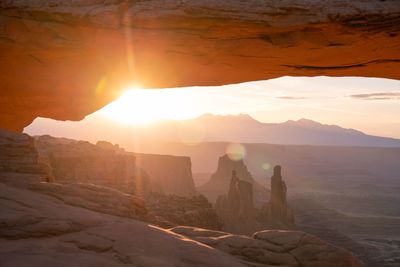 Scenic view of rocky mountains against sky during sunrise 