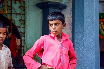 Portrait of young man looking at camera