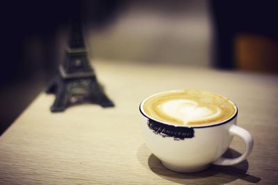 Close-up of coffee cup on table