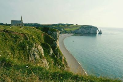 Scenic view of sea against cloudy sky