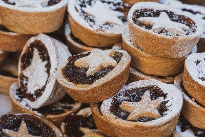 Piles of delicious artisan christmas mince pies at bath christmas market.