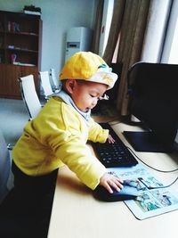 Cute boy playing at home