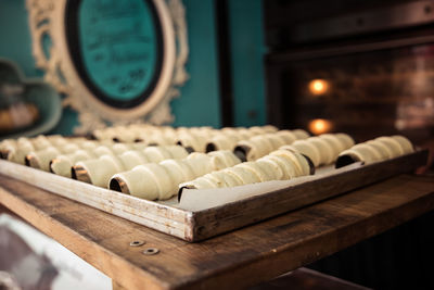 Close-up of food in baking tray on table in restaurant