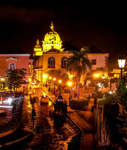 Illuminated cathedral against sky at night