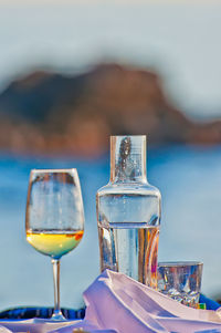 Close-up of wineglass on table