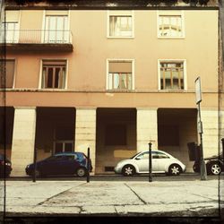Cars parked in front of building