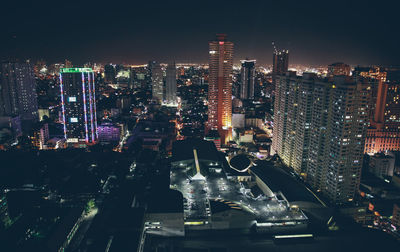 High angle view of illuminated cityscape at night