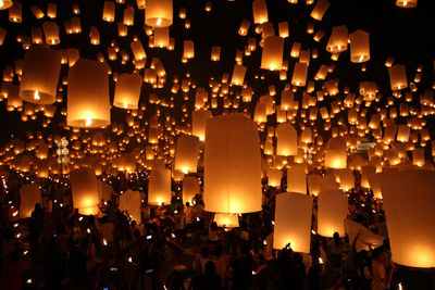 Crowd of people with lanterns