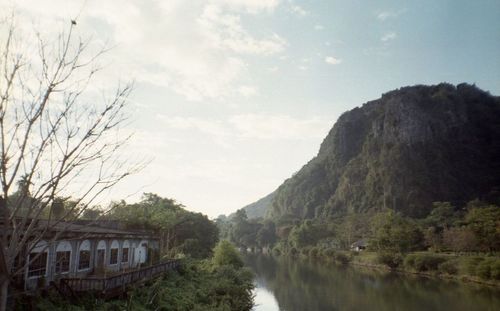 River amidst trees against sky