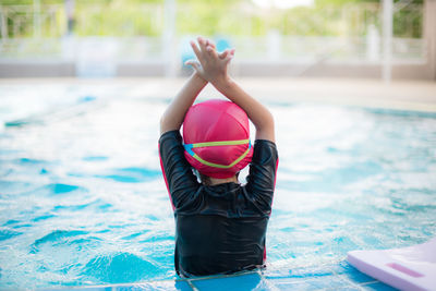 Girl swimming in pool