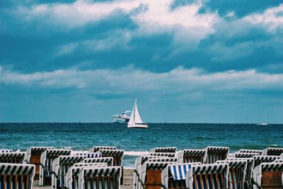 Sailboat on sea against sky