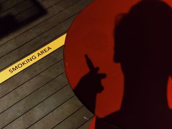 Shadow of man on table