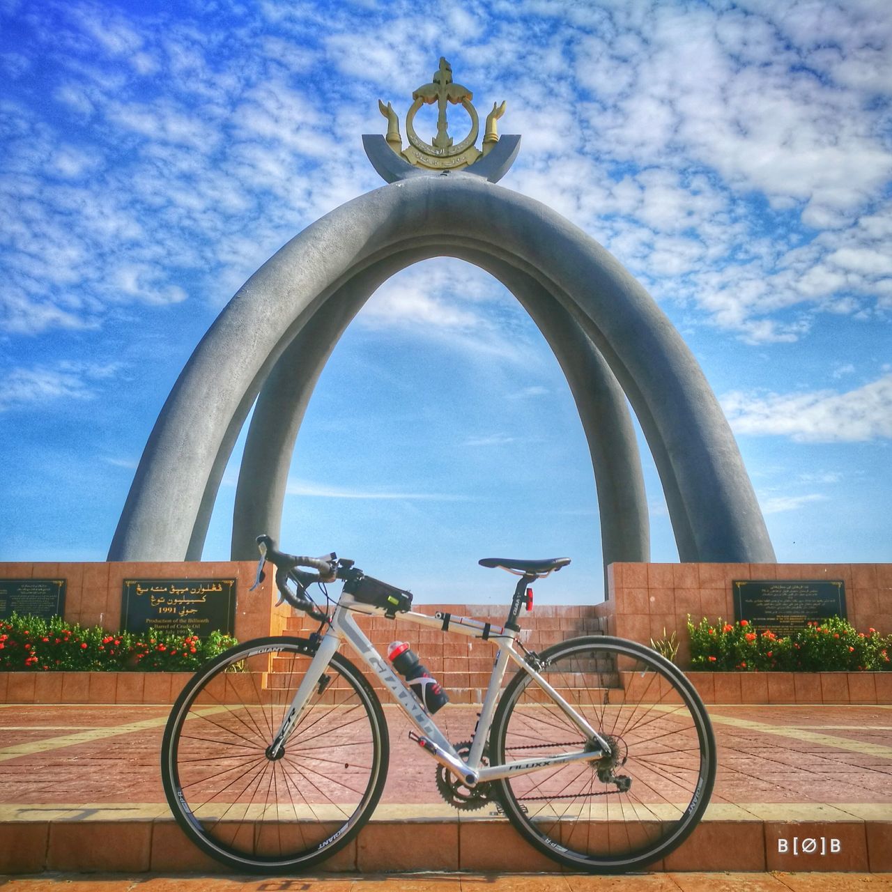 cloud - sky, sky, bicycle, day, architecture, outdoors, statue, no people, city