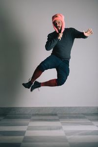 Portrait of man jumping