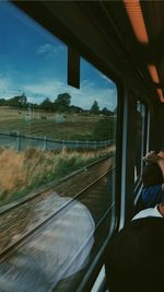 View of train through window